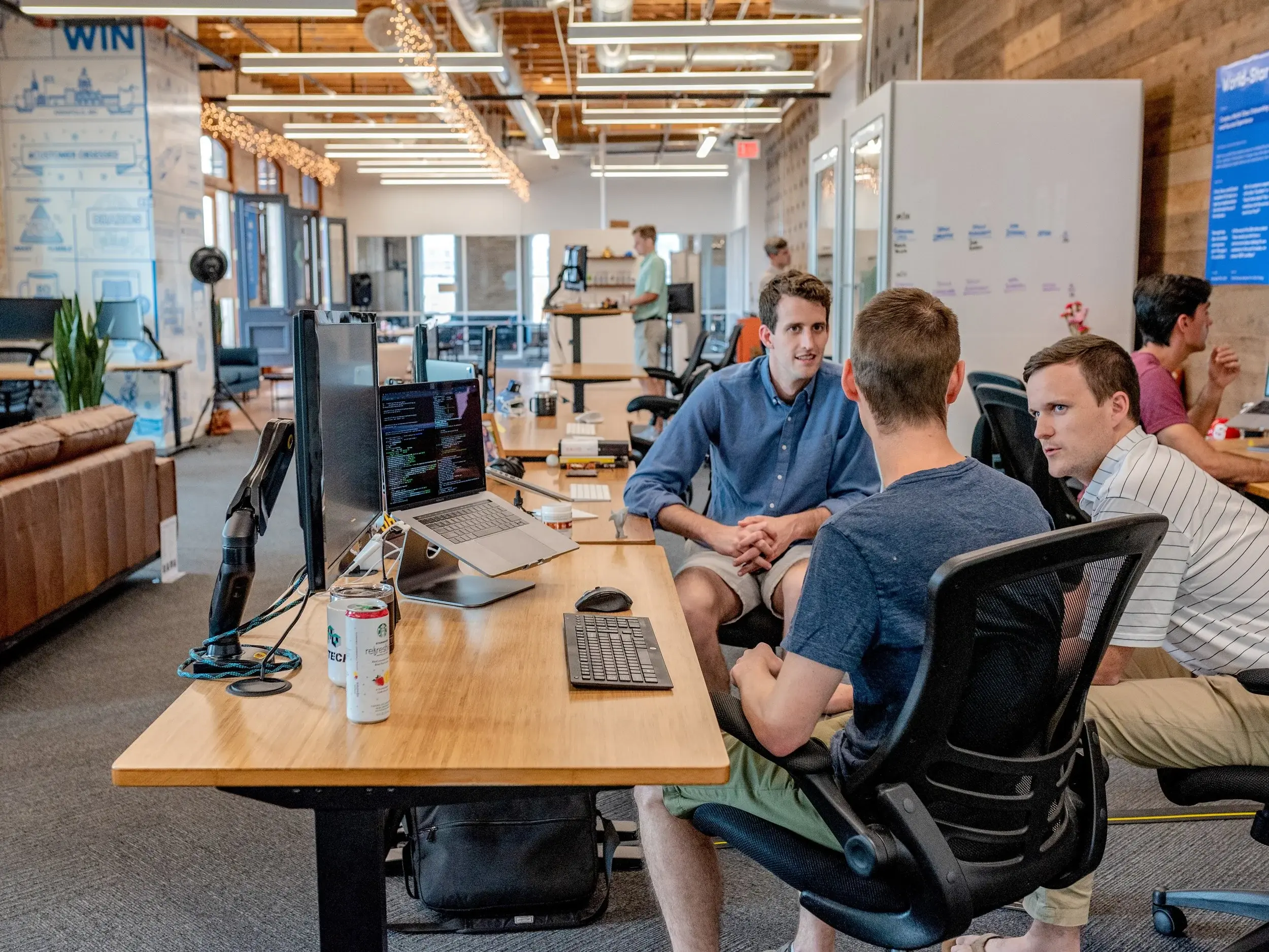 Developers working together at a laptop
