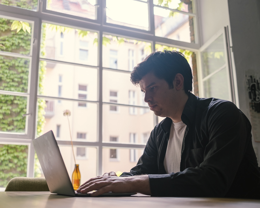 Patrick Da Silva working at a laptop